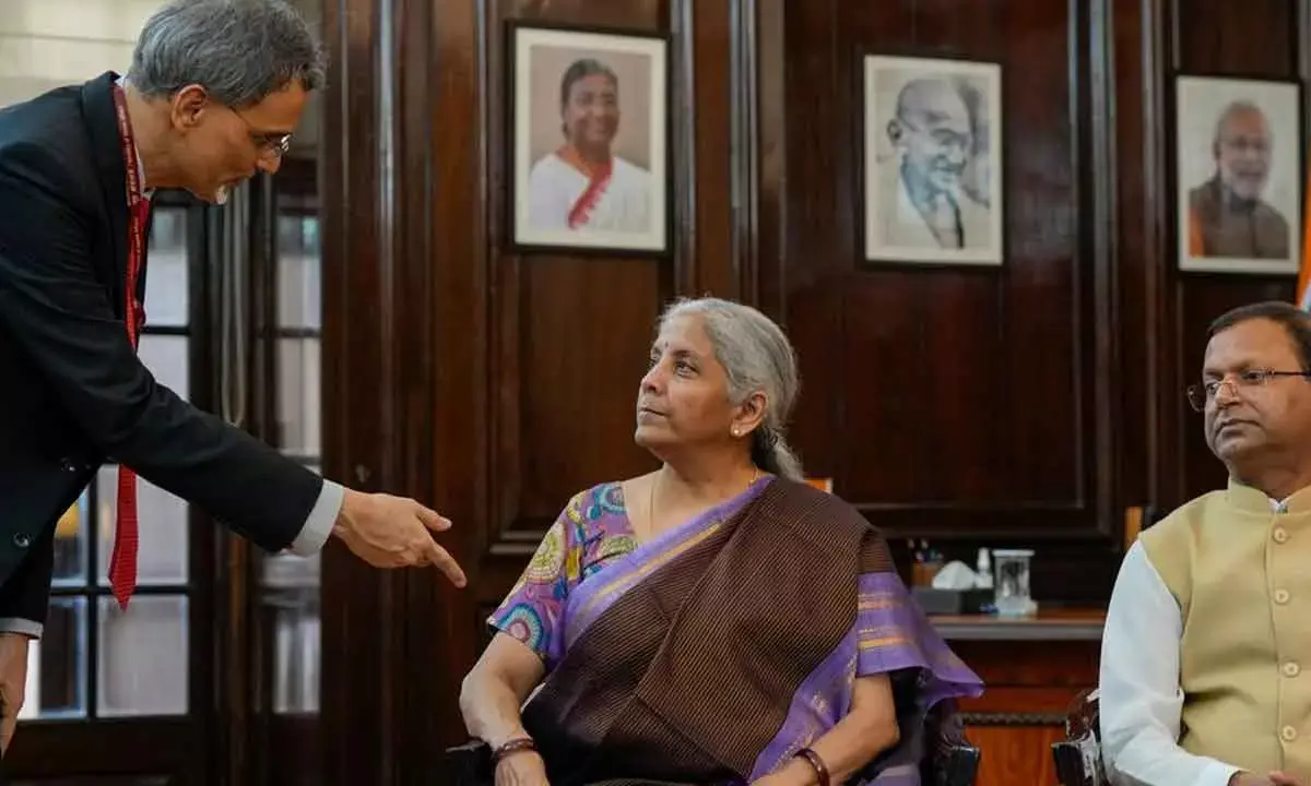 Finance Minister Nirmala Sitharaman having a word with Chief Economic Adviser V Anantha Nageswaran, while giving final touches to the Union Budget, in New Delhi on Monday. Pankaj Chaudhary, MoS for Finance, is also seen in the pic