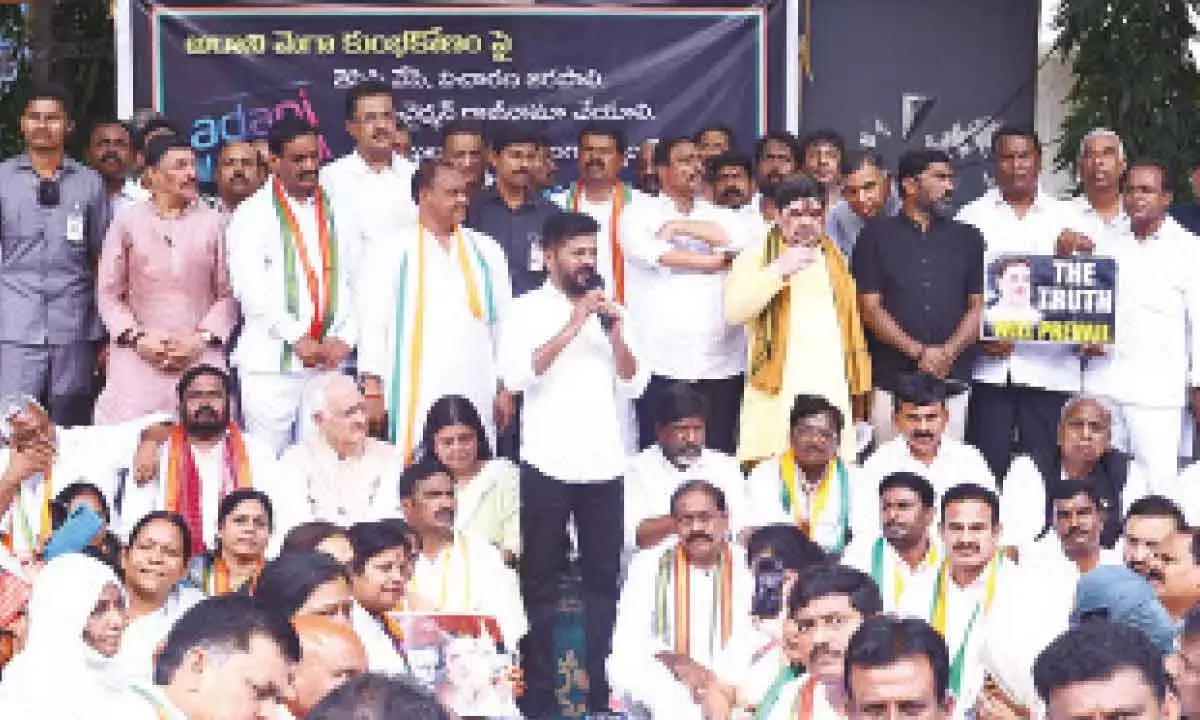 Adani scam probe: CM joins partymen in dharna at ED office