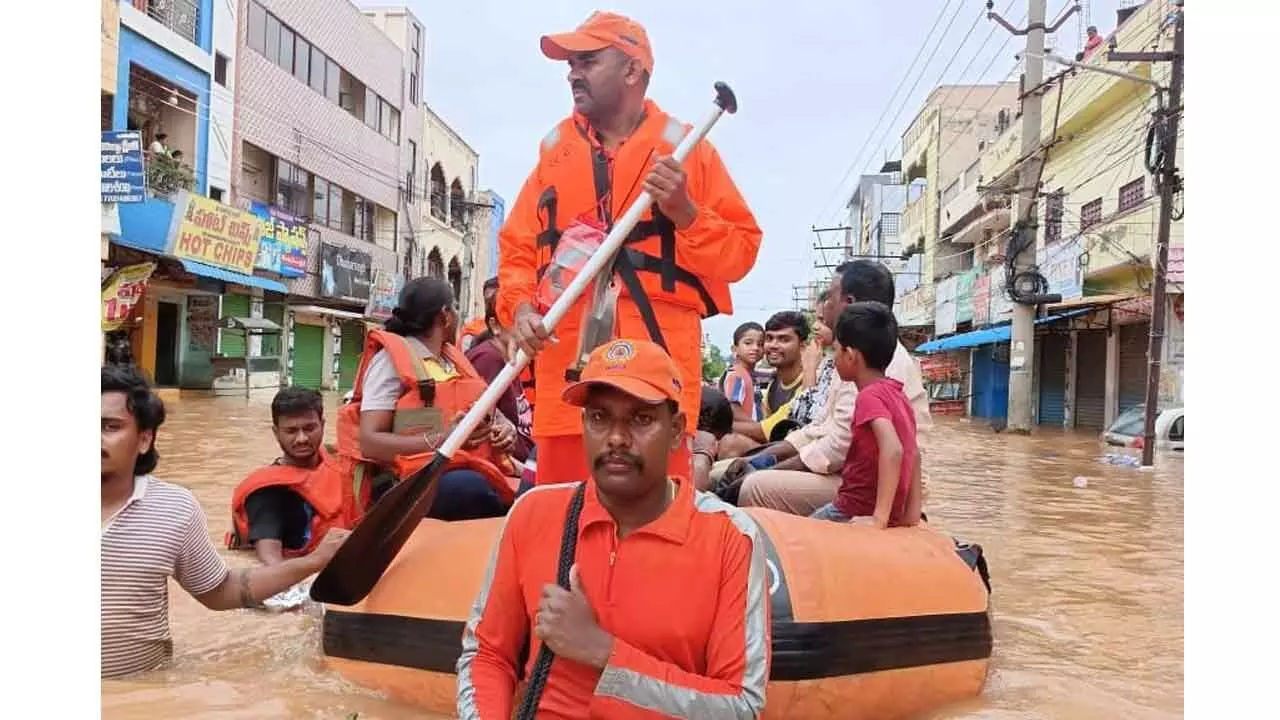 Helicopters deliver relief to flood-hit villages in AP Helicopters deliver relief to flood-hit villages in AP