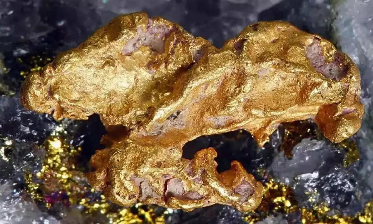 The stress on quartz during seismic activity generates piezoelectric voltages that produce gold nuggets