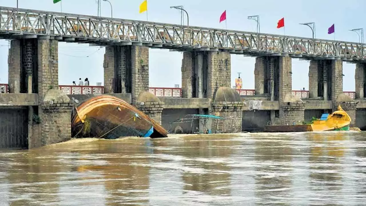 CID Arrests Two As Flood Blame Game Intensifies Between TDP And YSRCP CID Arrests Two As Flood Blame Game Intensifies Between TDP And YSRCP