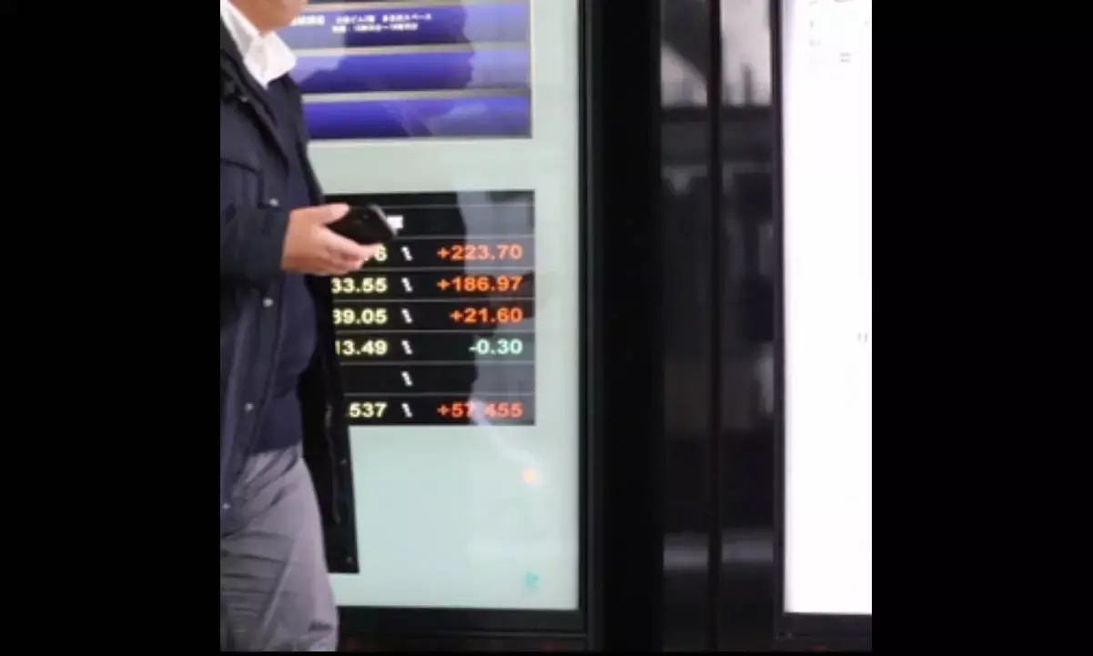 Tokyo stocks fall over Wall Street declines, Middle East conflict concerns