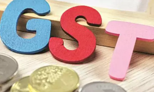 GST panel deliberates on lowering rate on health insurance, tractors