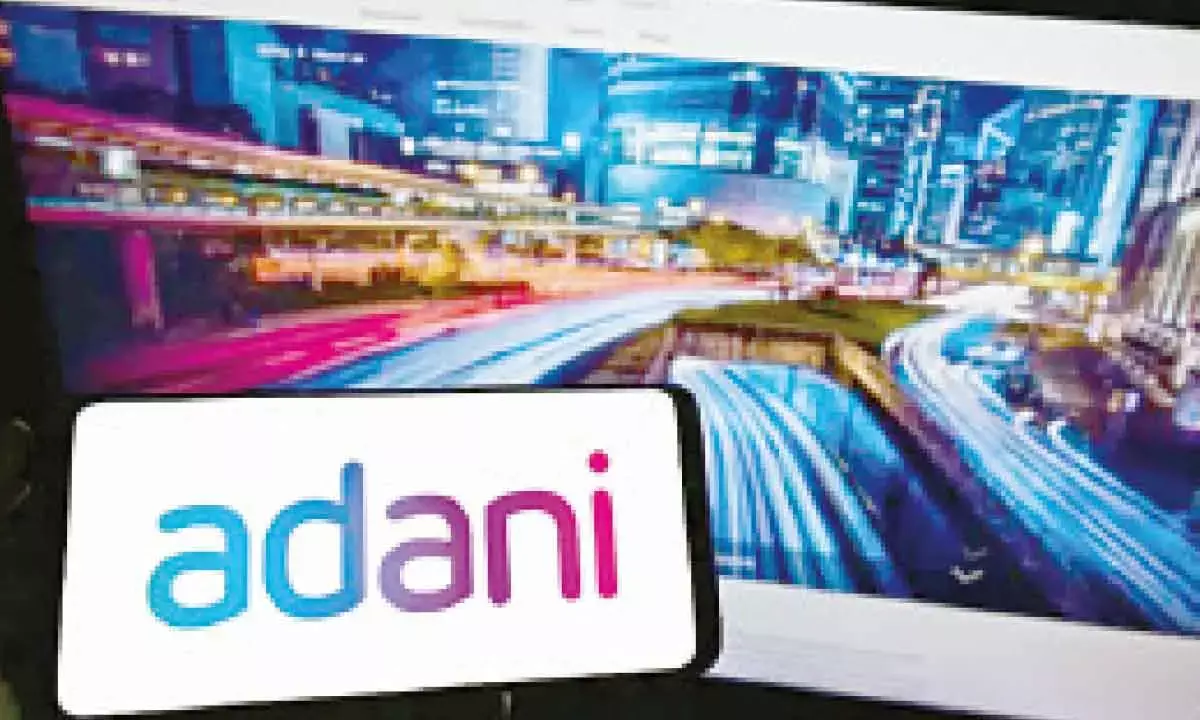 9 Adani Group Firms Settle Higher