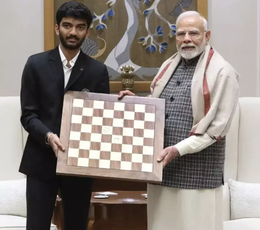 PM Modi meets youngest chess World Champion Gukesh D, receives original chessboard from his victory PM Modi meets youngest chess World Champion Gukesh D, receives original chessboard from his victory