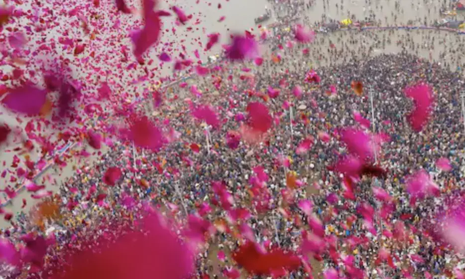Rose petals rain down on devotees during Amrit Snan at Maha Kumbh