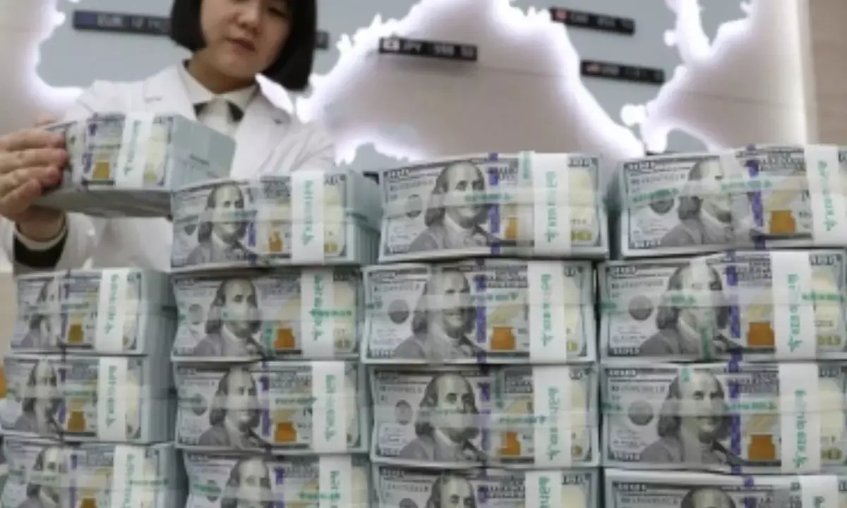 Seoul shares turn lower amid rising woes over US protectionism