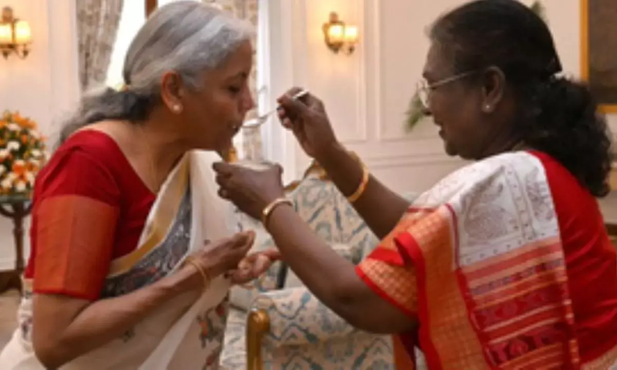 President Murmu feeds customary dahi-cheeni to FM Sitharaman