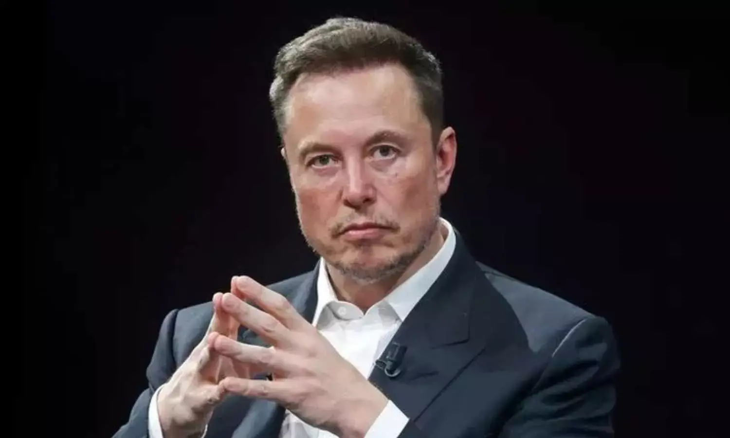 Musk hits back at Altman over Tesla delay claim