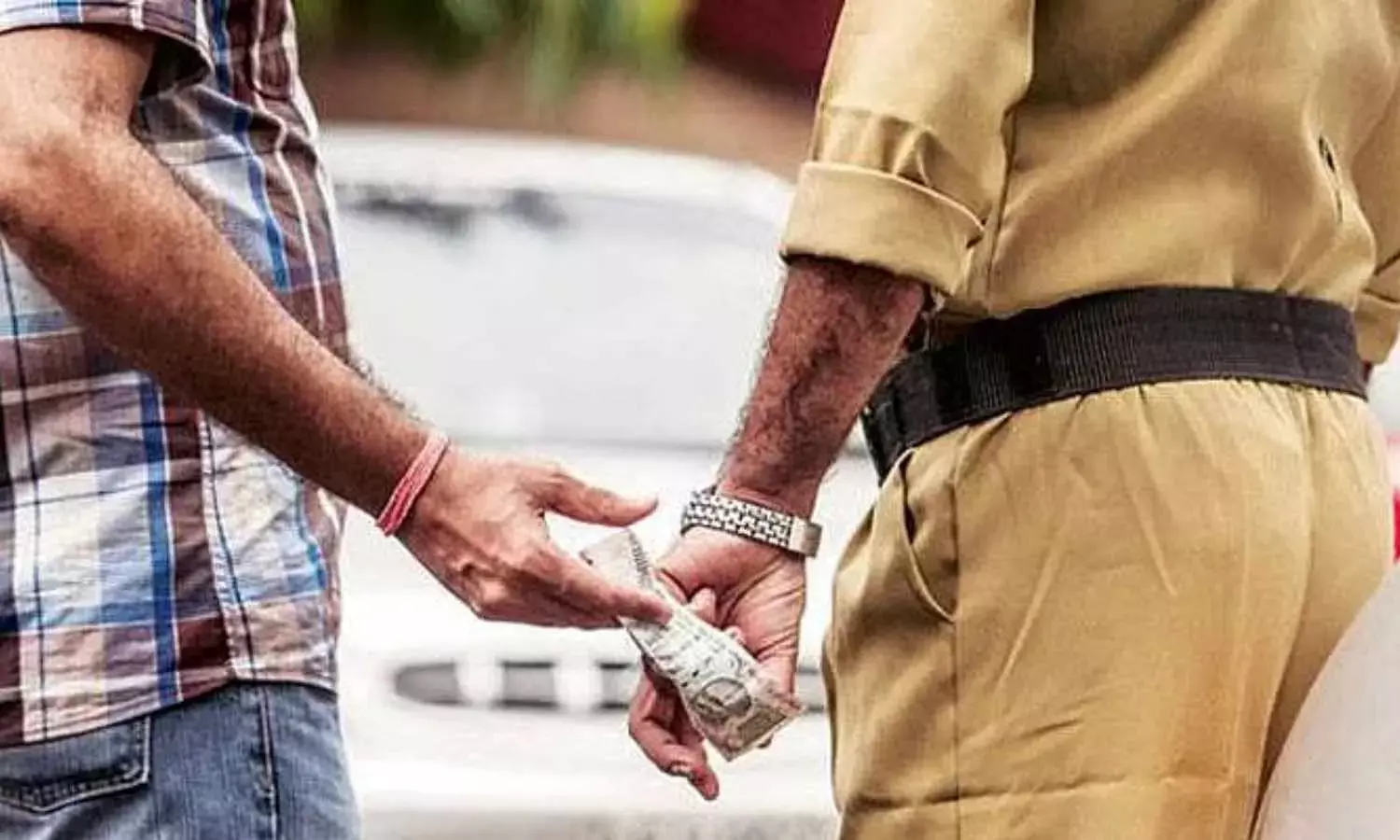 Two Police Officers Arrested for Bribery in Bengaluru