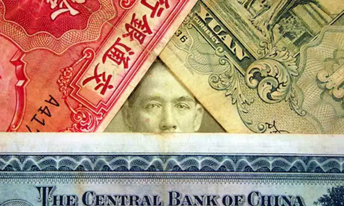 China May Devalue Yuan: Economist