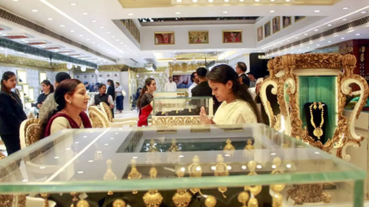 Gold prices drop sharply by Rs 2,375 per 10 grams; silver also falls Gold prices drop sharply by Rs 2,375 per 10 grams; silver also falls