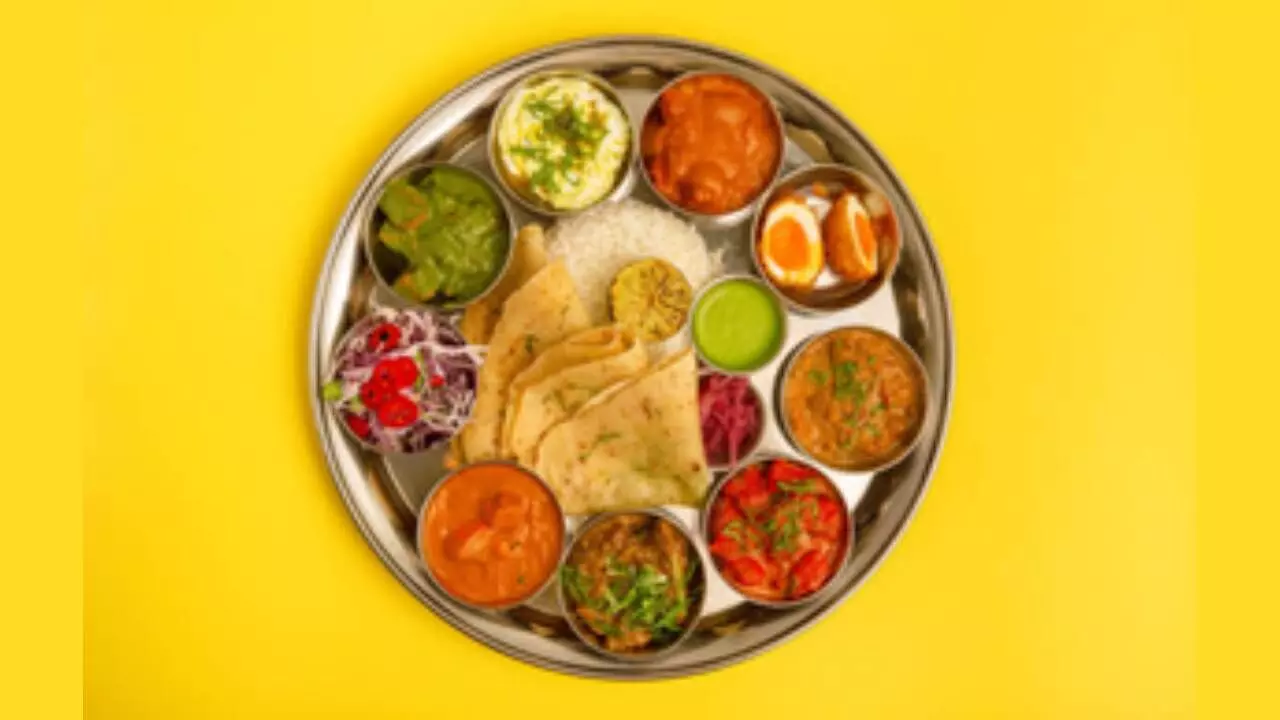 Home-cooked veg, non-veg thalis get cheaper in May as food inflation cools: Crisil Home-cooked veg, non-veg thalis get cheaper in May as food inflation cools: Crisil