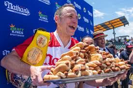 Joey Chestnut Returns! Watch Nathan’s Hot Dog Eating Contest 2025 Live: Time, TV, Odds & Records