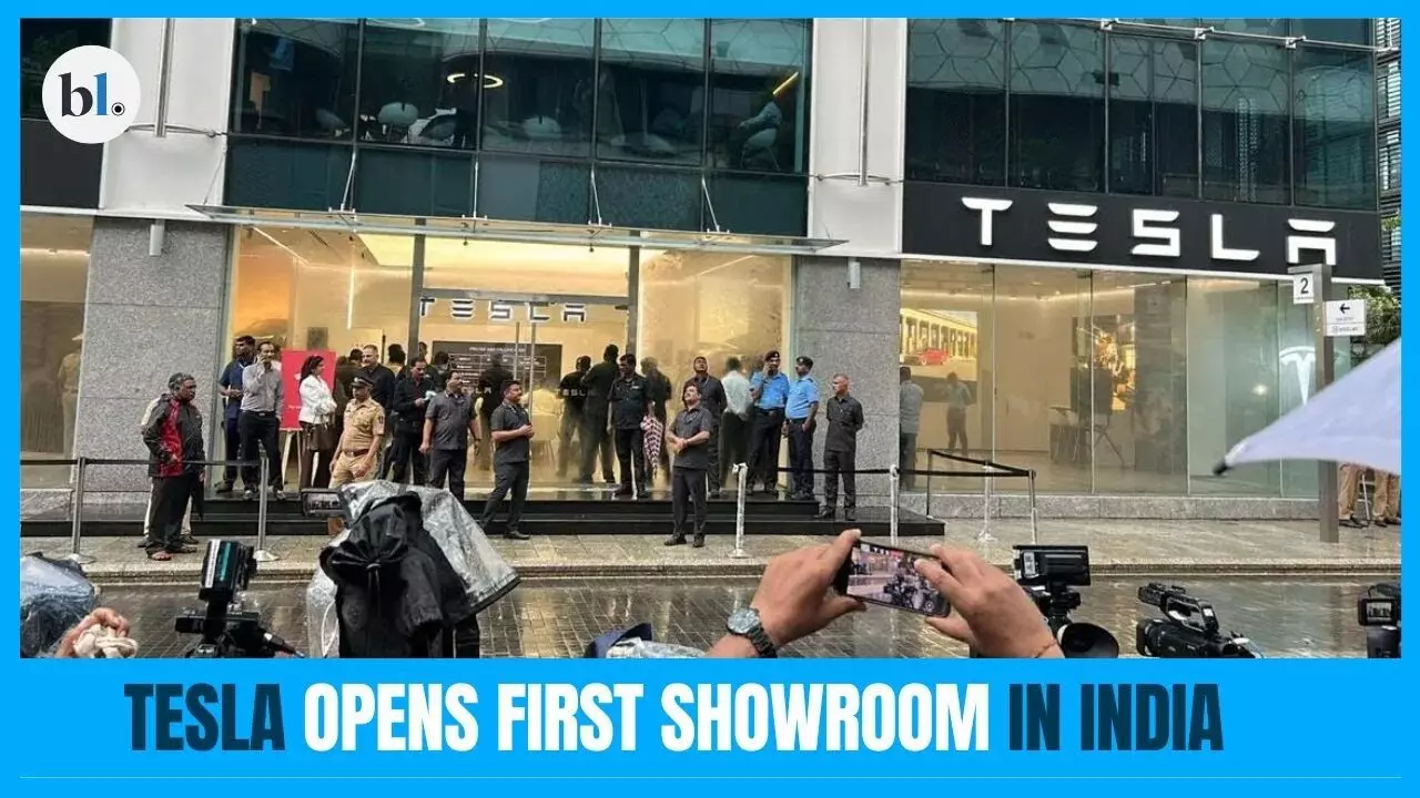 Tesla Opens First Showroom in India at Mumbai’s BKC: Check Model Y Price, Features, Top Speed & Launch Timeline Tesla Opens First Showroom in India at Mumbai’s BKC: Check Model Y Price, Features, Top Speed & Launch Timeline