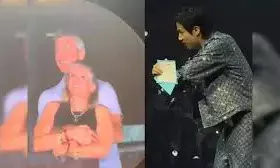 BTSs Jin Recreates Viral Coldplay CEO Hug at Concert—Fans Left in Splits