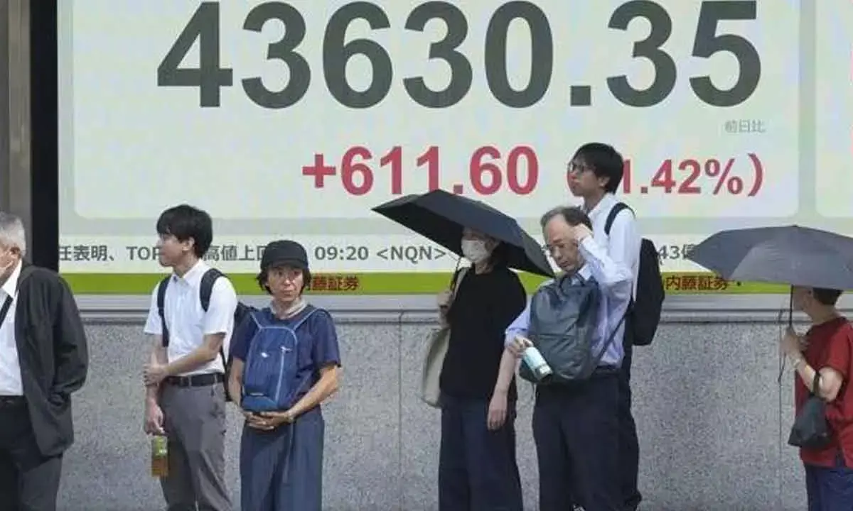 Global shares rise after Japan PM announces plan to resign