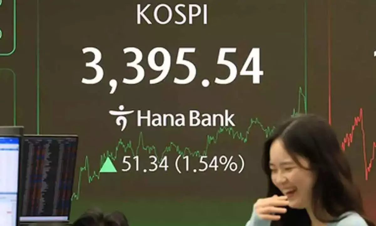 KOSPI soars to new record high on chip rally, US rate cut hopes