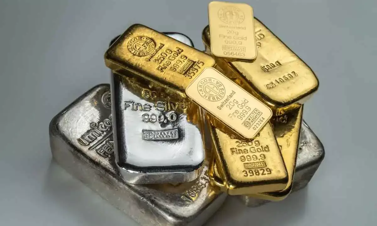 Precious metals drop in futures trade
