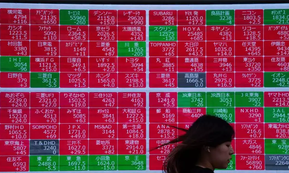 World shares mixed as earnings reports boost Wall St