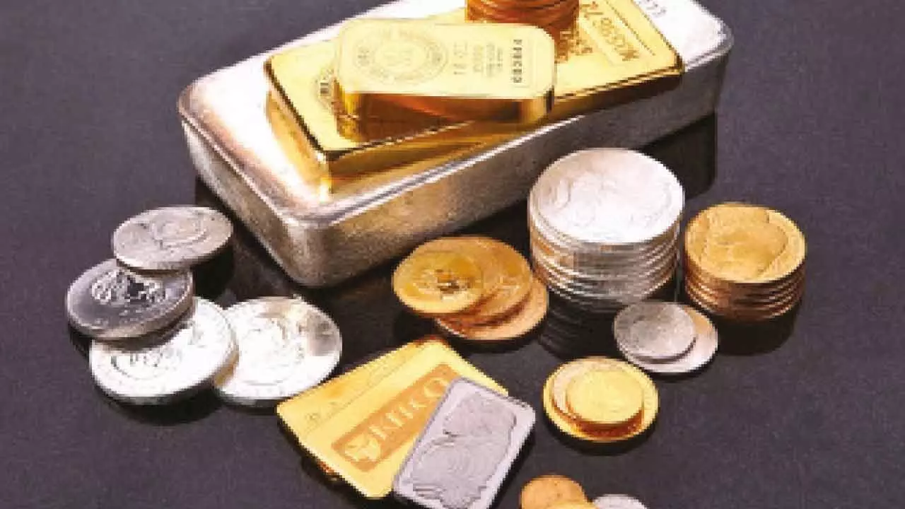 Precious metals edge lower after strong US jobs data