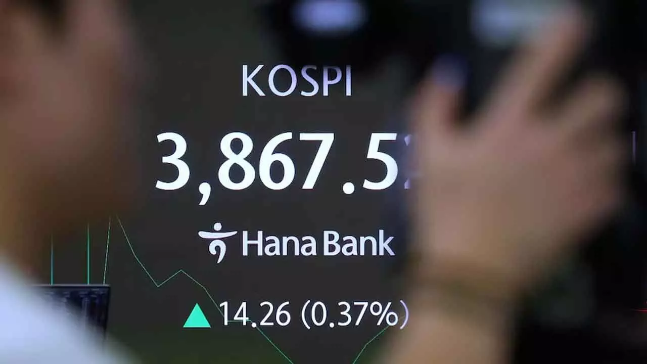 World shares mixed as traders pin hopes on rate cut by Fed