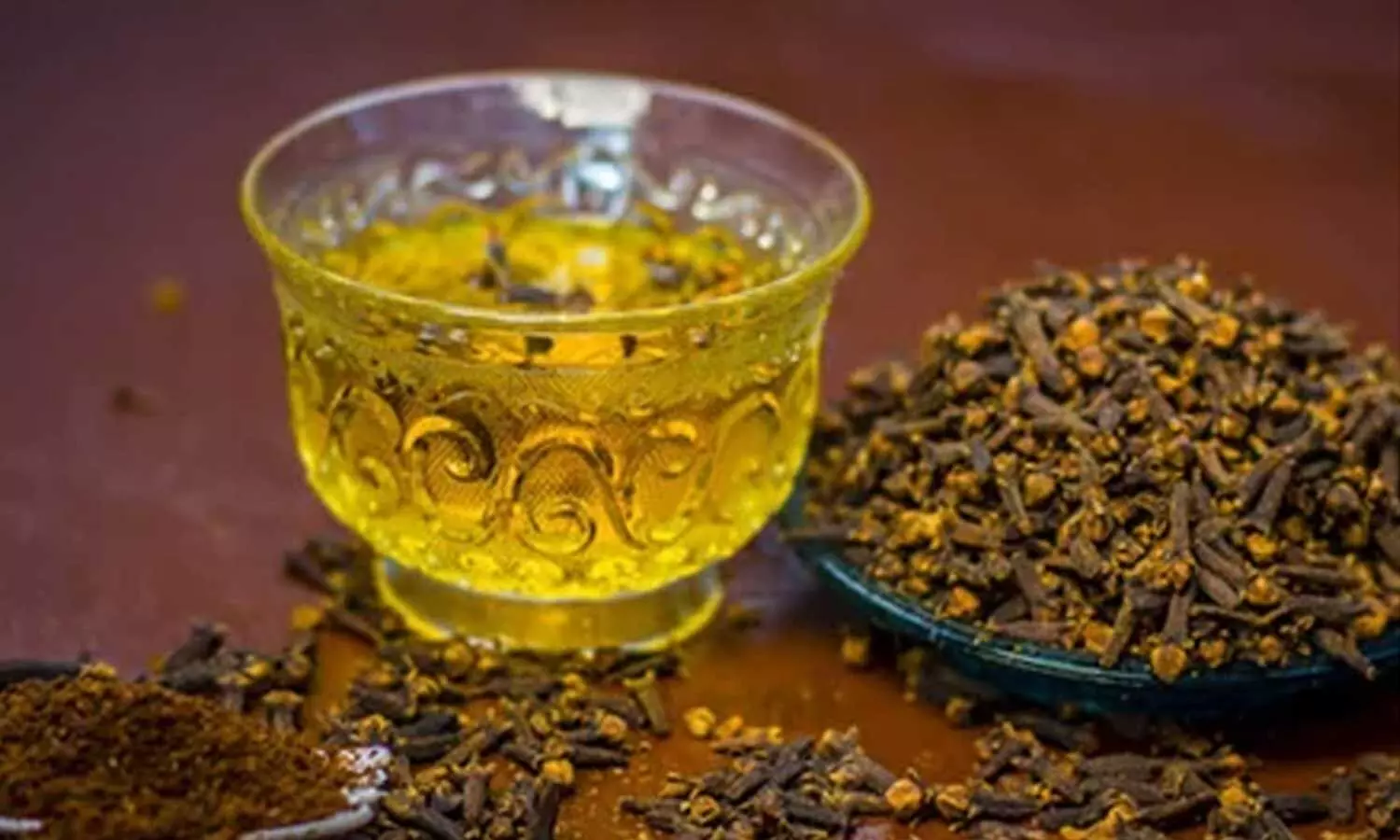 Clove Water: Health Benefits And Precautions Explained Clove Water: Health Benefits And Precautions Explained