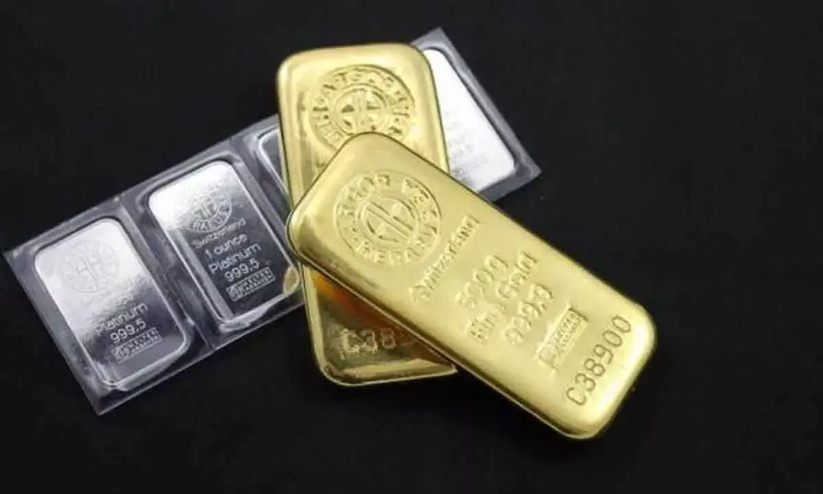 Gold, silver futures drop ahead of US data