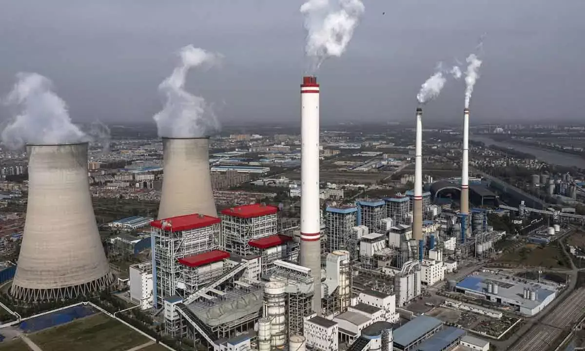 Why China is building so many coal plants despite its solar, wind boom