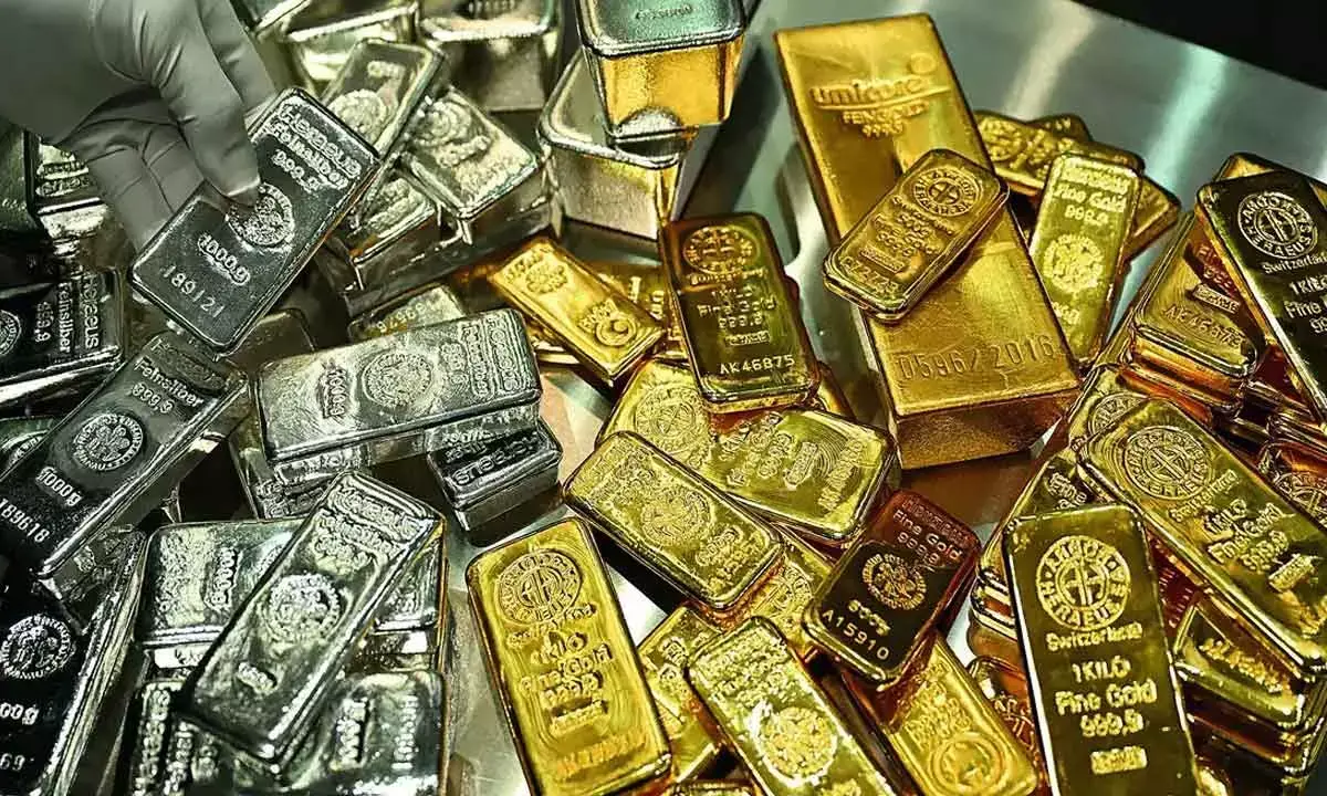 Bullion futures decline around 2%