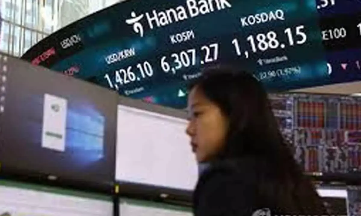 Seoul shares continue record-breaking rally to close above 6,300