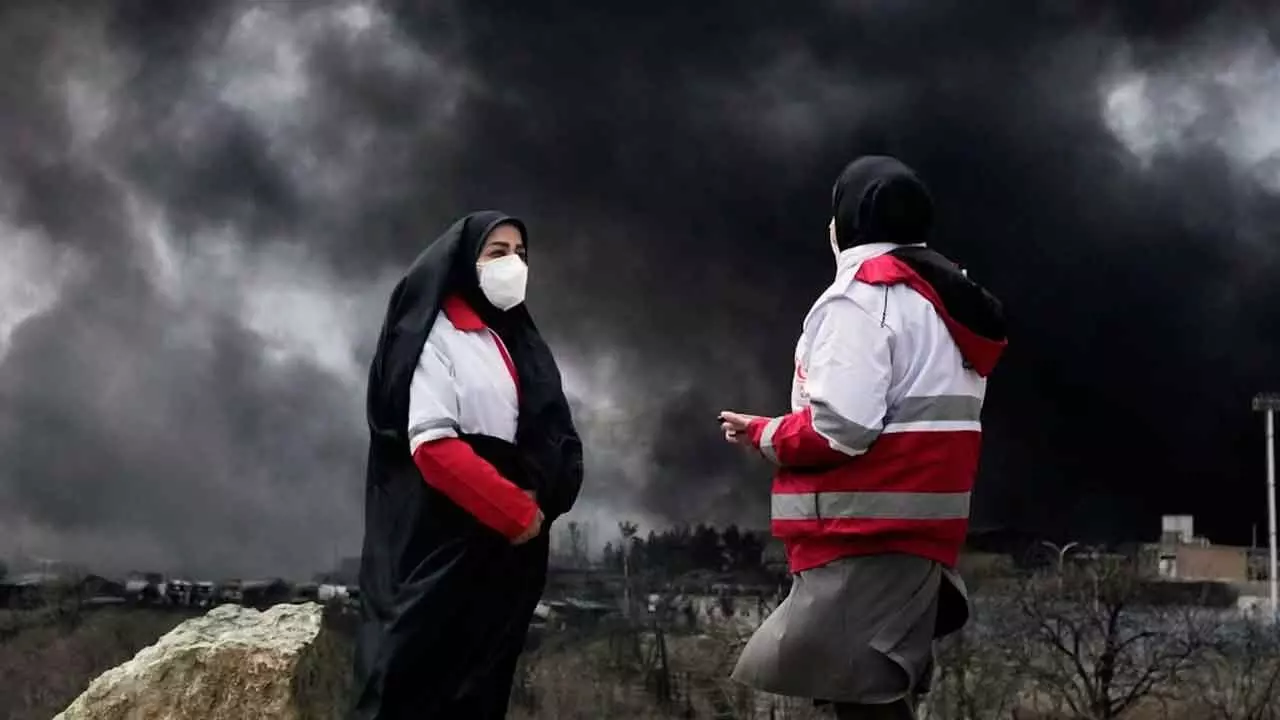 Black rain after Iran airstrikes raises toxic pollution fears